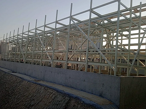 Multi-cell cooling tower structure erected on an RCC basin